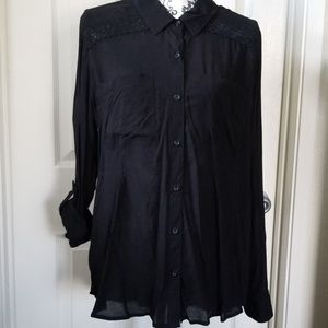 Long sleeve rolled to 3/4. Never worn blouse